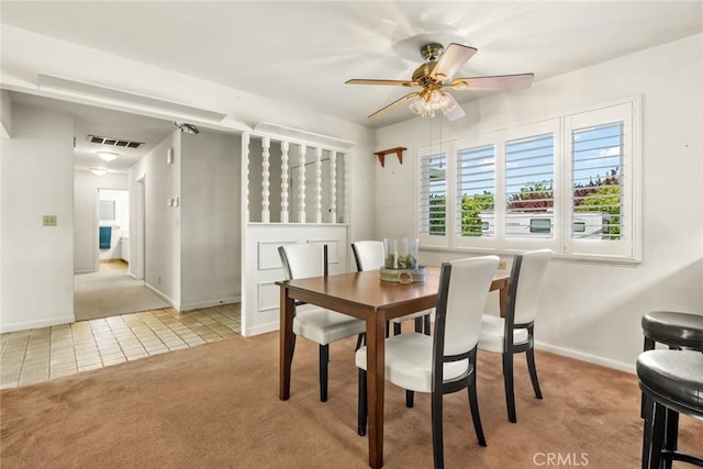 7 Pinecrest Cir, Chico, CA 95926 - dining area with light carpet, ceiling fan, baseboards, and light tile patterned floors