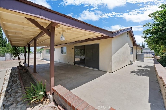 26111 Abdale St, Newhall, CA 91321 - view of patio featuring central AC unit