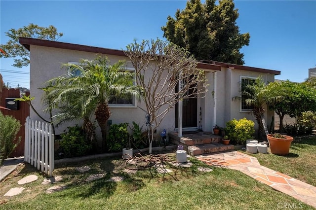 4024 W 166th St, Lawndale, CA 90260 - view of front facade with stucco siding and a front lawn