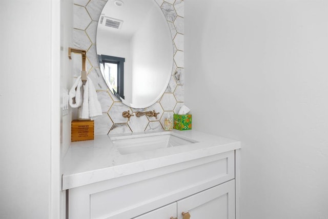 3030 Ibsen, Point Loma, CA 92106 - bathroom featuring decorative backsplash and vanity