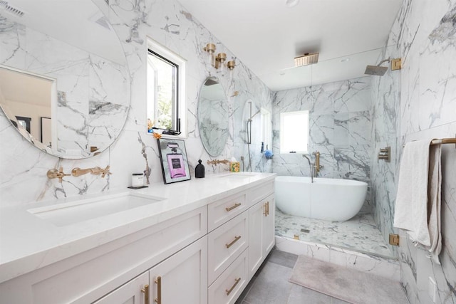 3030 Ibsen, Point Loma, CA 92106 - bathroom featuring double vanity, tile walls, a freestanding tub, and a marble finish shower