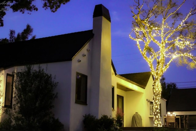 3030 Ibsen, Point Loma, CA 92106 - view of side of home featuring a chimney and stucco siding