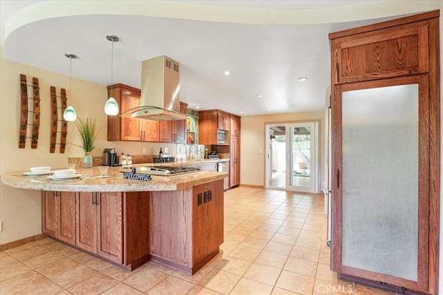 1256 Bostonia St Unit B, El Cajon, CA 92021 - kitchen with island exhaust hood, baseboards, a peninsula, light countertops, and recessed lighting