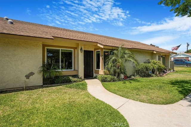 1256 Bostonia St Unit B, El Cajon, CA 92021 - view of front of property with a front lawn and stucco siding