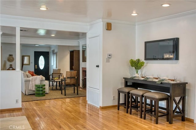2407 E Woodlyn Rd, Pasadena, CA 91104 - living area featuring hardwood / wood-style flooring, crown molding, baseboards, and recessed lighting