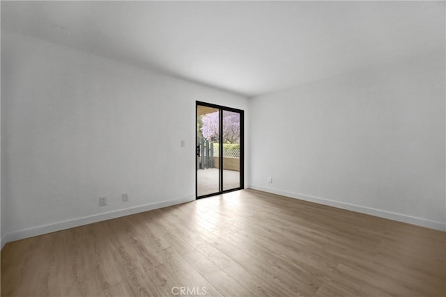 4499 Via Marisol Unit 105A, Los Angeles, CA 90042 - unfurnished room with light wood-style flooring and baseboards