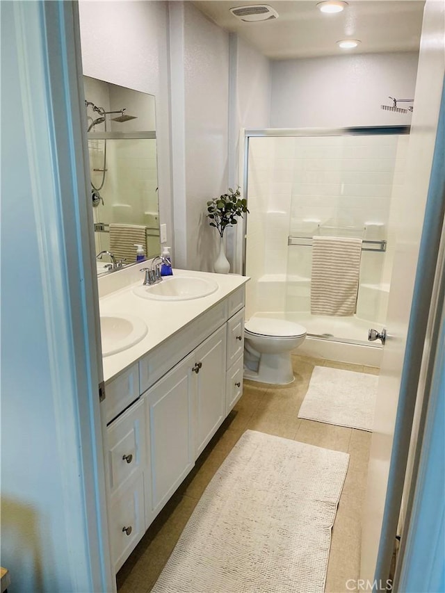 14120 W Willow Ln, Van Nuys, CA 91405 - full bathroom with a stall shower, double vanity, and tile patterned floors
