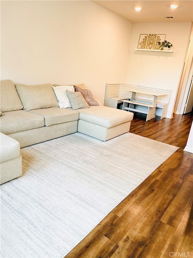 14120 W Willow Ln, Van Nuys, CA 91405 - living room with dark wood-style flooring and recessed lighting
