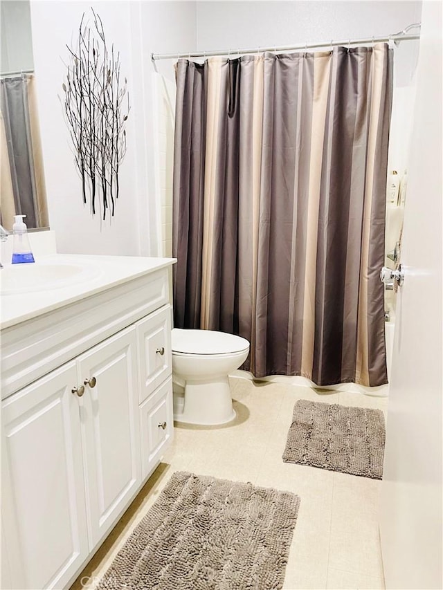 14120 W Willow Ln, Van Nuys, CA 91405 - full bathroom featuring vanity, tile patterned floors, and shower / bath combo