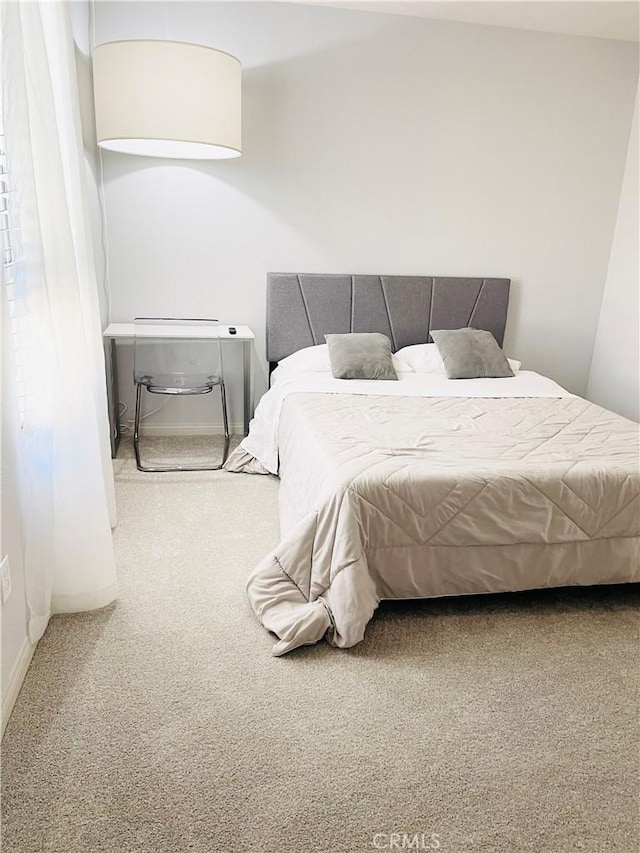 14120 W Willow Ln, Van Nuys, CA 91405 - bedroom with carpet and baseboards