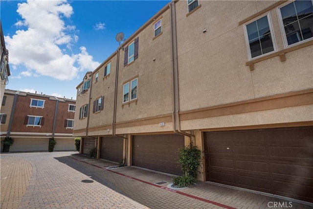 14120 W Willow Ln, Van Nuys, CA 91405 - view of property with a garage