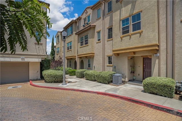 14120 W Willow Ln, Van Nuys, CA 91405 - view of property featuring an attached garage