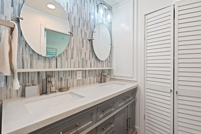 600 N The Strand Unit 3, Oceanside, CA 92054 - full bathroom with double vanity and tasteful backsplash