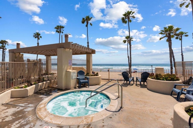 600 N The Strand Unit 3, Oceanside, CA 92054 - view of pool with a community hot tub, a water view, a patio, and a pergola