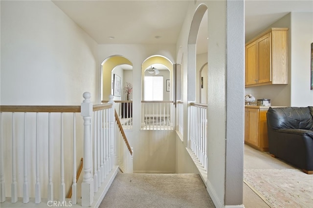 2983 Orchid Ln, Turlock, CA 95382 - hallway featuring an upstairs landing, light carpet, and baseboards