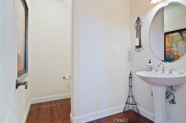 2983 Orchid Ln, Turlock, CA 95382 - bathroom featuring wood finished floors and baseboards