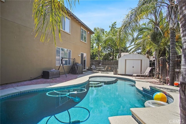 2983 Orchid Ln, Turlock, CA 95382 - view of swimming pool featuring a fenced backyard, a patio area, and a hot tub