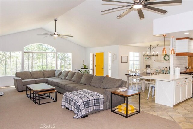 33708 Bronco Ln, Squaw Valley, CA 93675 - living room with ceiling fan, a chandelier, high vaulted ceiling, and light tile patterned flooring