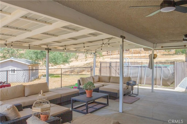 33708 Bronco Ln, Squaw Valley, CA 93675 - view of patio featuring an outdoor living space and a ceiling fan