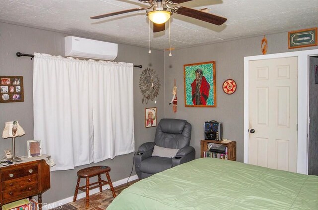 33708 Bronco Ln, Squaw Valley, CA 93675 - bedroom with an AC wall unit, baseboards, and a ceiling fan