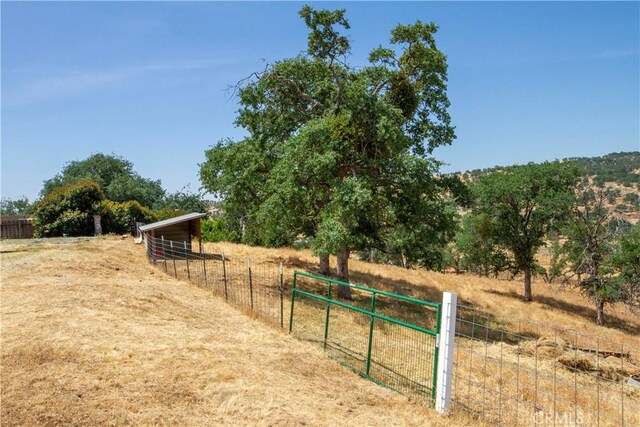 33708 Bronco Ln, Squaw Valley, CA 93675 - view of property's community with a rural view and an outdoor structure