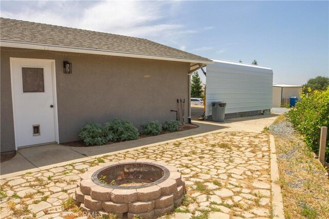 33708 Bronco Ln, Squaw Valley, CA 93675 - view of patio / terrace with a fire pit