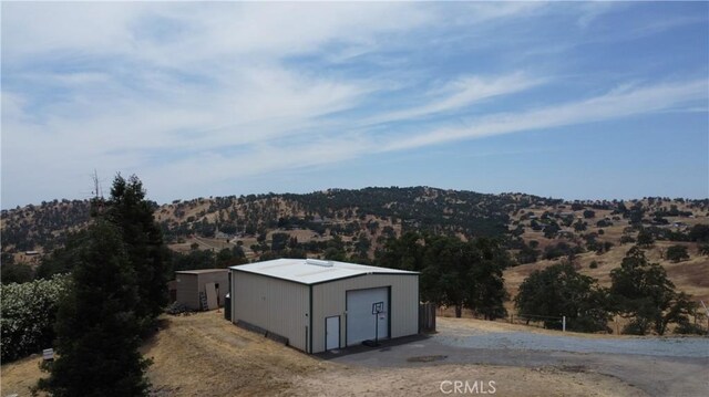 33708 Bronco Ln, Squaw Valley, CA 93675 - view of outdoor structure with a mountain view