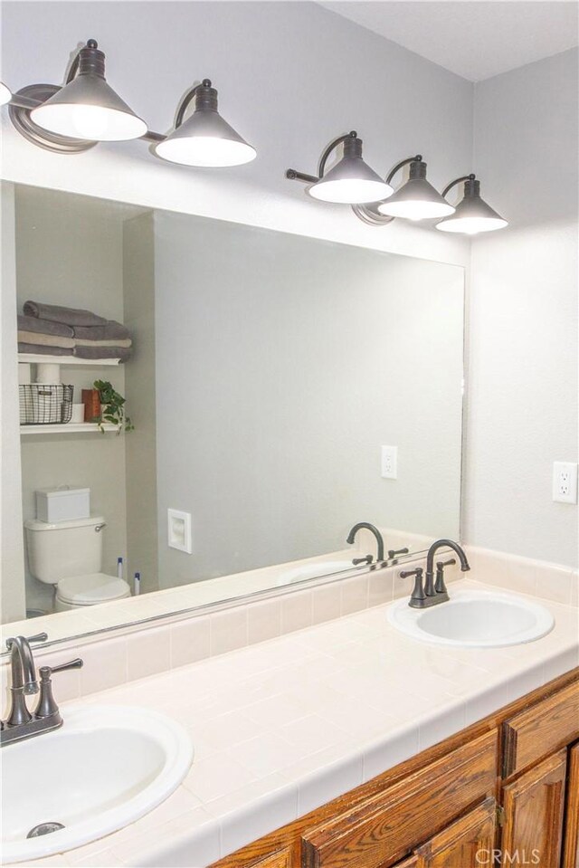 33708 Bronco Ln, Squaw Valley, CA 93675 - bathroom featuring toilet and double vanity