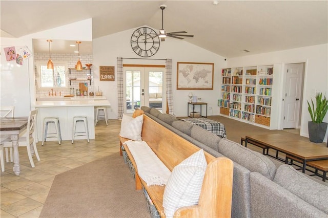 33708 Bronco Ln, Squaw Valley, CA 93675 - living room with ceiling fan, vaulted ceiling, french doors, and light tile patterned floors