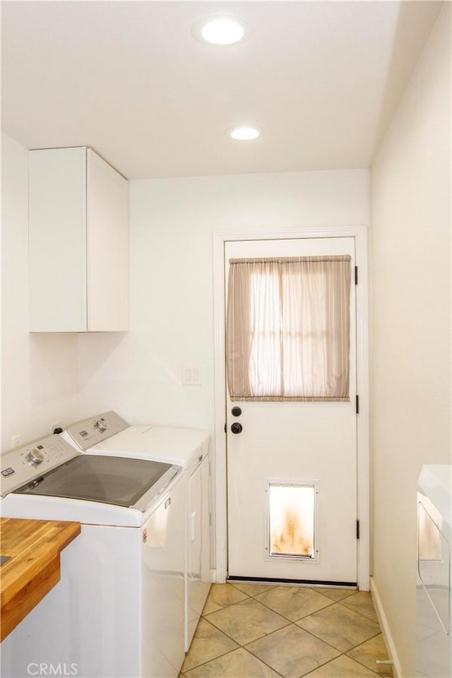 33708 Bronco Ln, Squaw Valley, CA 93675 - laundry area with separate washer and dryer, light tile patterned floors, recessed lighting, and cabinet space