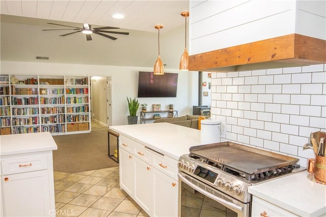 33708 Bronco Ln, Squaw Valley, CA 93675 - kitchen with stainless steel range, open floor plan, ceiling fan, white cabinets, and pendant lighting
