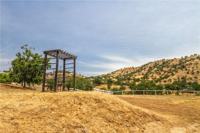 33708 Bronco Ln, Squaw Valley, CA 93675 - view of play area featuring a rural view and a mountain view