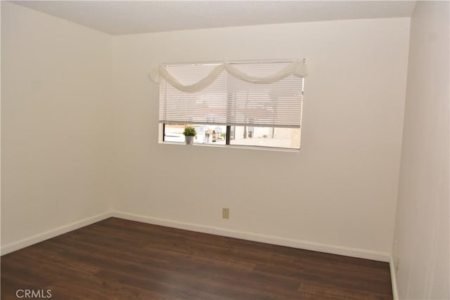 15351 Orange Ave Unit 25, Paramount, CA 90723 - empty room with dark wood-type flooring and baseboards