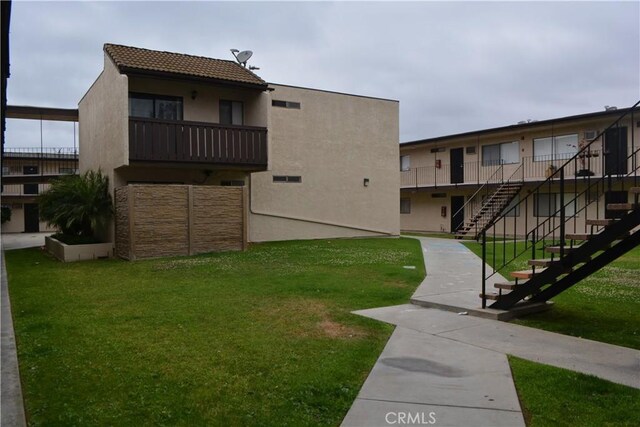 15351 Orange Ave Unit 25, Paramount, CA 90723 - view of building exterior featuring stairway