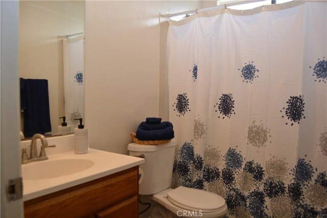 15351 Orange Ave Unit 25, Paramount, CA 90723 - bathroom featuring vanity and curtained shower