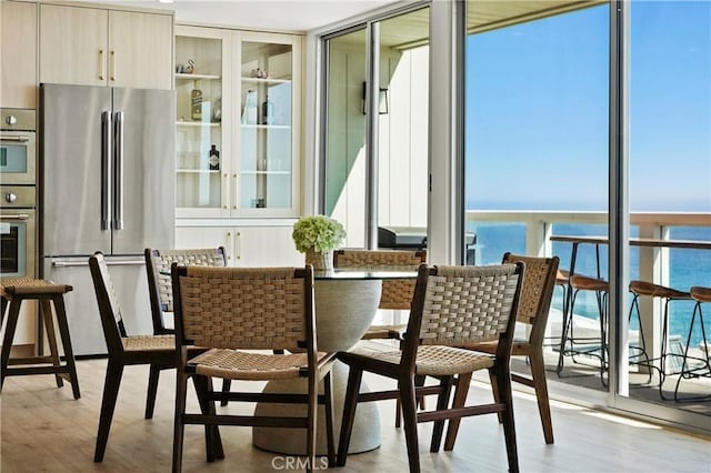 11938 Whitewater Ln, Malibu, CA 90265 - dining room with wood finished floors and expansive windows
