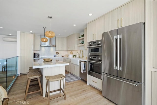 11938 Whitewater Ln, Malibu, CA 90265 - kitchen with appliances with stainless steel finishes, open shelves, a sink, light countertops, and a breakfast bar area