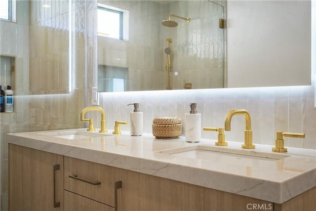 11938 Whitewater Ln, Malibu, CA 90265 - bathroom view of double vanity, tasteful backsplash, and tiled shower