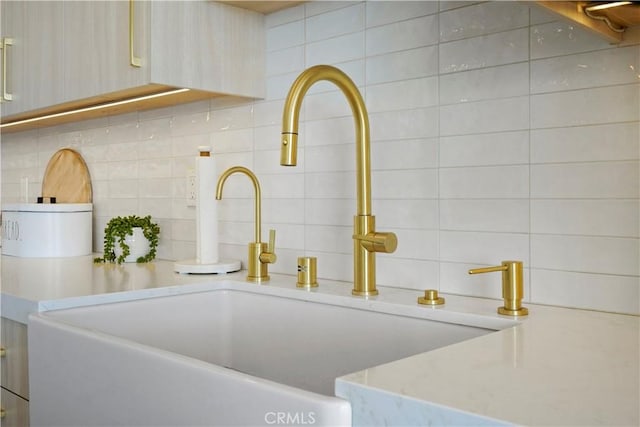 11938 Whitewater Ln, Malibu, CA 90265 - kitchen view of a sink, tasteful backsplash, and light countertops