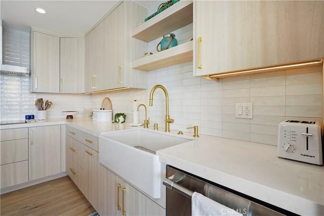 11938 Whitewater Ln, Malibu, CA 90265 - kitchen with a sink, light countertops, open shelves, decorative backsplash, and wall chimney exhaust hood