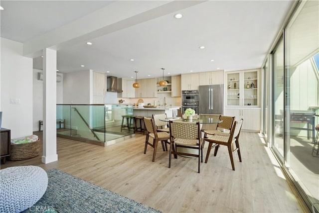 11938 Whitewater Ln, Malibu, CA 90265 - dining space with light wood finished floors and recessed lighting