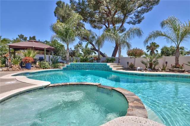 27071 Crews Hill Dr, Menifee, CA 92586 - view of pool with a pool with connected hot tub, a fenced backyard, and a gazebo