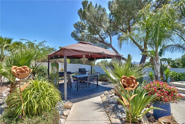 27071 Crews Hill Dr, Menifee, CA 92586 - view of patio with a gazebo and outdoor dining space