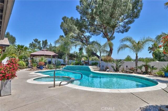27071 Crews Hill Dr, Menifee, CA 92586 - view of pool featuring a gazebo, an in-ground hot tub, a fenced backyard, and a patio area