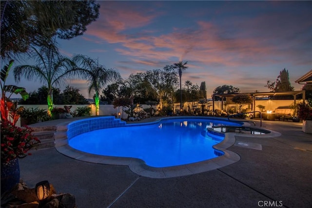 27071 Crews Hill Dr, Menifee, CA 92586 - pool at dusk featuring an in-ground hot tub and a patio area
