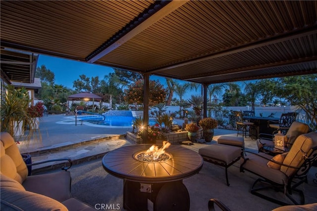 27071 Crews Hill Dr, Menifee, CA 92586 - view of patio with an outdoor fire pit, an outdoor pool, and outdoor dining area