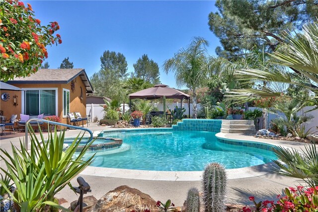 27071 Crews Hill Dr, Menifee, CA 92586 - view of pool with a gazebo, a pool with connected hot tub, and a patio