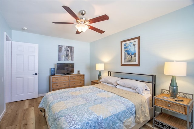 27071 Crews Hill Dr, Menifee, CA 92586 - bedroom with wood finished floors, ceiling fan, and baseboards