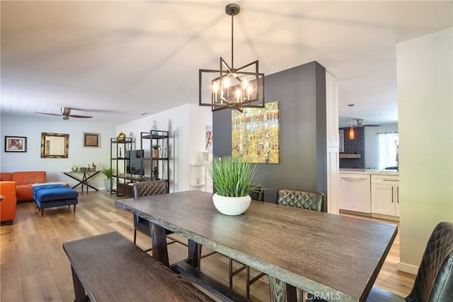 27071 Crews Hill Dr, Menifee, CA 92586 - dining room with a ceiling fan, a chandelier, and light wood-type flooring