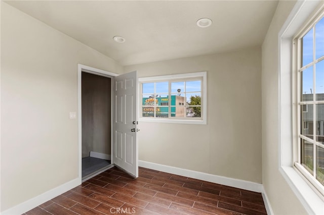 10010 S San Pedro St, Los Angeles, CA 90003 - spare room featuring baseboards, dark wood finished floors, and recessed lighting